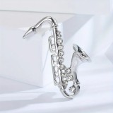                        Bross kitűző saxofon Kitűzők, Brossok